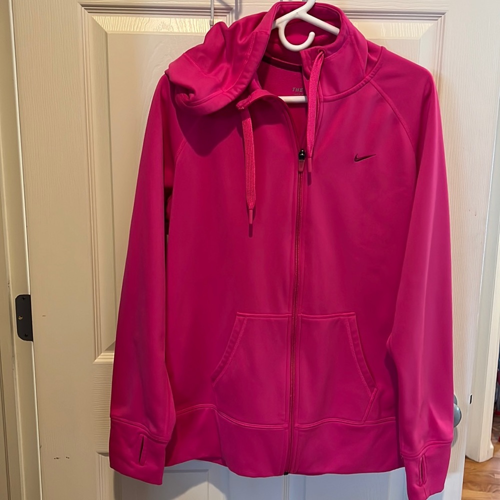 Pink Nike zip jacket. Size XL. Fleece lining. Longer sleeves with thumb holes